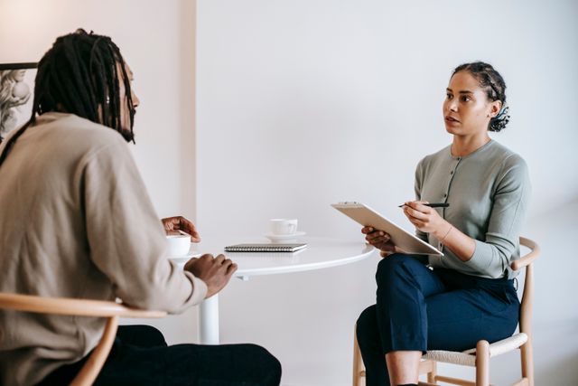A landlord interviewing a potential renter